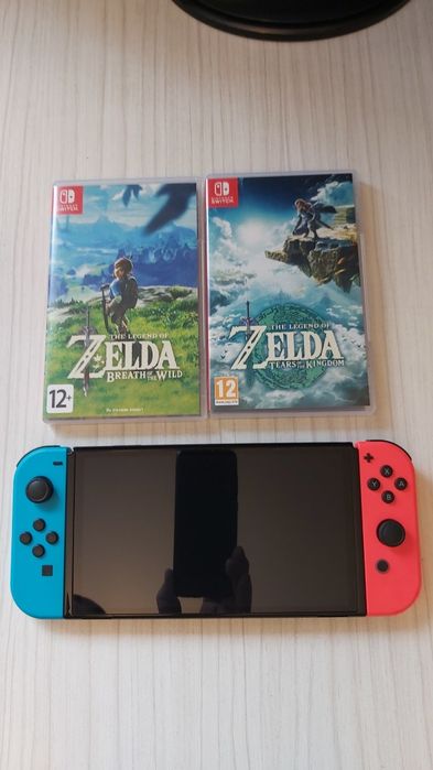 Consola Nintendo Switch OLED - pachet complet + 2 jocuri la alegere
