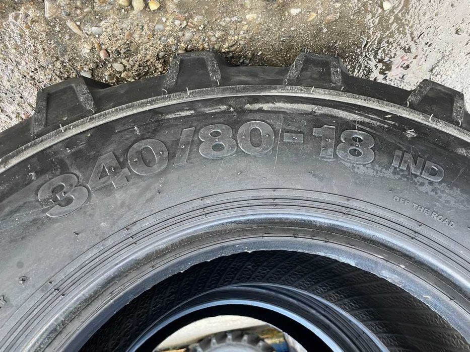 Anvelope noi 340/80-18 cu garantie marca OZKA pentru buldo fata