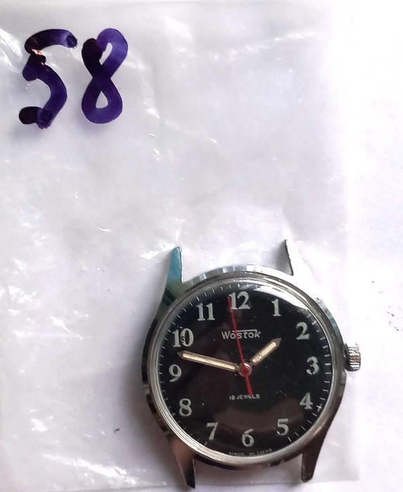 Ceas WOSTOK  Tip Militar, cadran Negru ,, 18 rubine