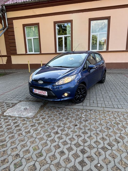 Ford Fiesta Titanium 2010 1.3 benzină, motor clasic fară turbo Euro 5, are numere roșii valabile, ofer fiscal rapid la vânzare.