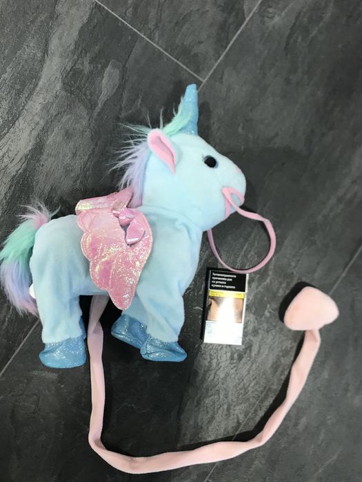 Пеещ , светещ и танцуващ Еднорог