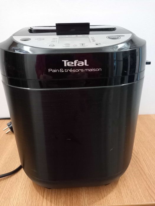 Masina paine Tefal si storcator fructe Braun
