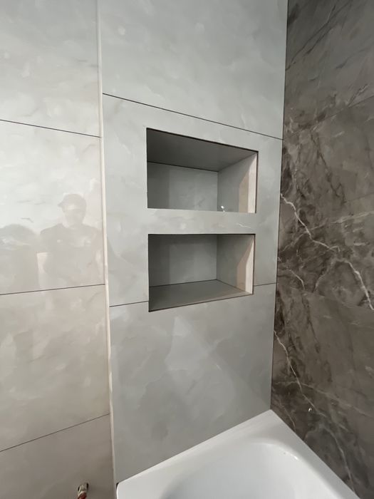 Опытный кафельщик