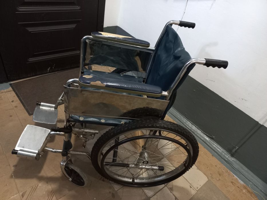 Инвалидная кресло коляска.