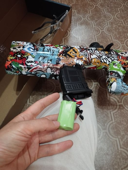 Игрушка автомат заряжается