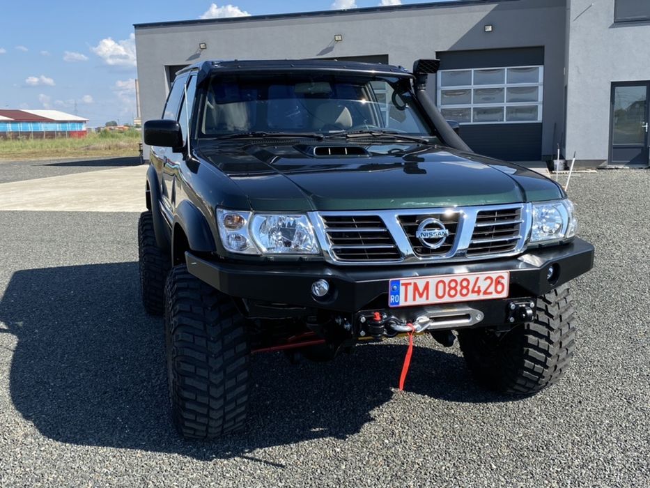 Bara fata Nissan Patrol Y61 cu suport de troliu