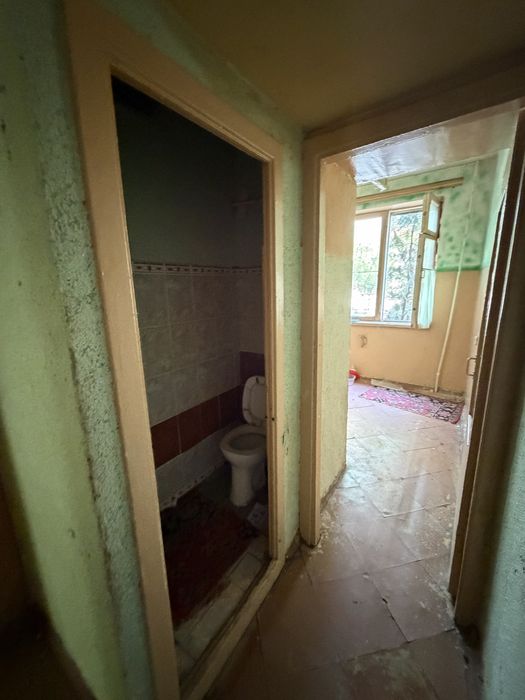 Навои шахар милий банк. Оркасидан 1 этаж 3 хоналик квартира сотилади