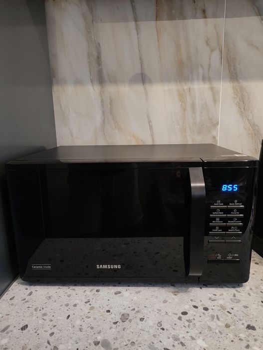 Cuptor microunde Samsung 23L negru interior ceramic GARANTIE 08.2026