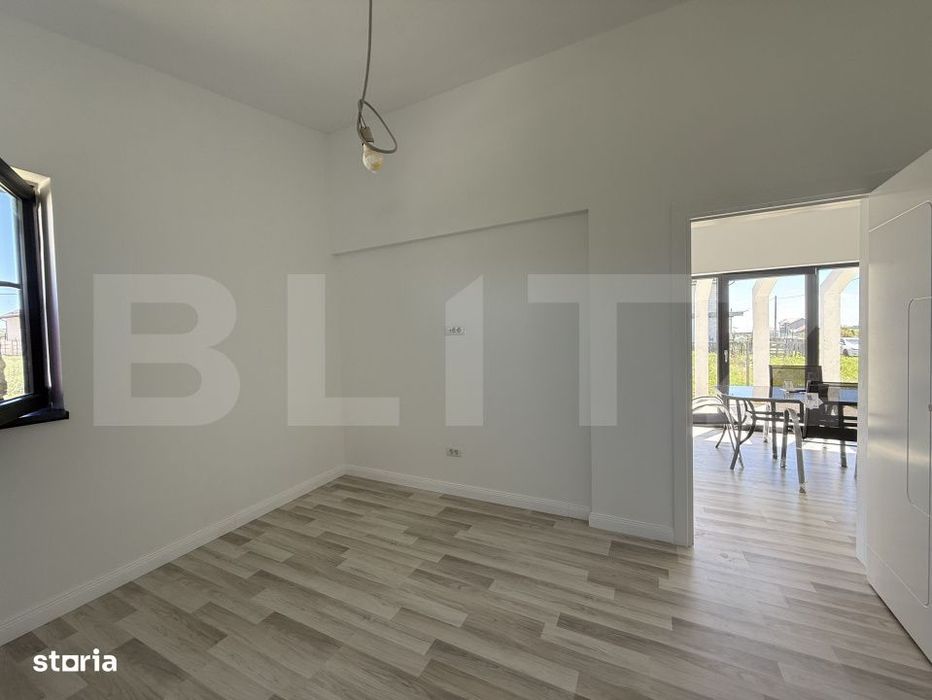 Casa pe parter cu un design deosebit, zona nordica / Simnicul de Jos