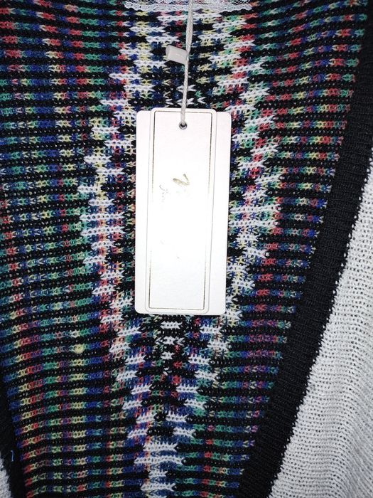 Poncho imprimeu aztec