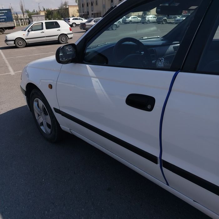 Тоёта карина е в