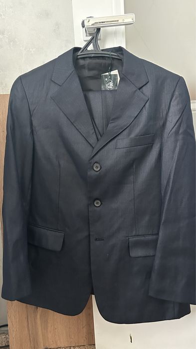 Костюмы новые