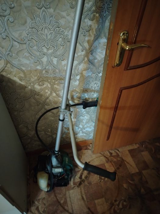Бензиновый тример