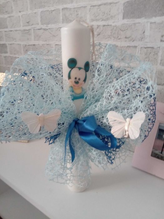 Vând lumânări botez