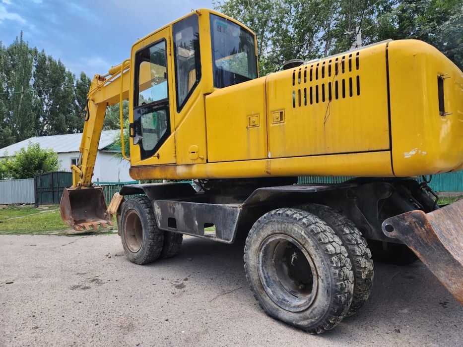 Колесной экскаватор XCMG 2010