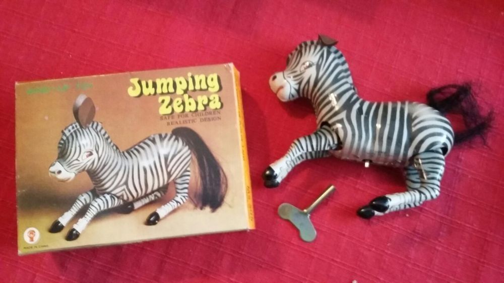Jucarii chinezesti '80: fetita cu rotobil, zebra (perioada comunista)