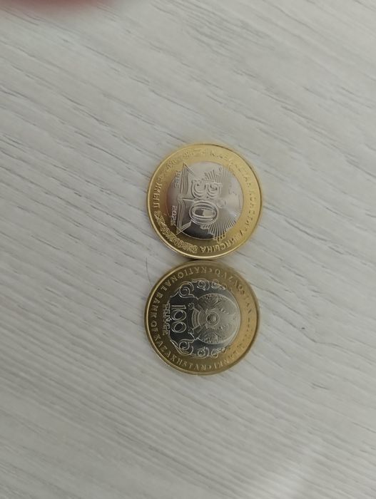 Монета номиналом 100 тг колекционая