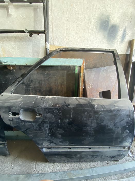 Двери на 124 мерс