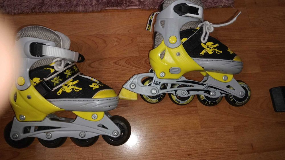 Role copii marca STS, masura reglabila 31-34 - produs in stare buna