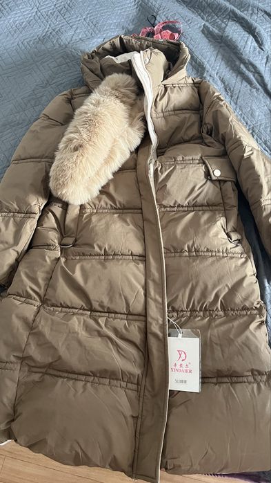 Продам куртки коричневая новая