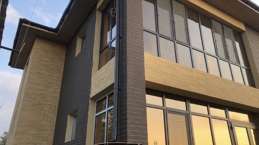 фасадные панели под травертин для вашего дома