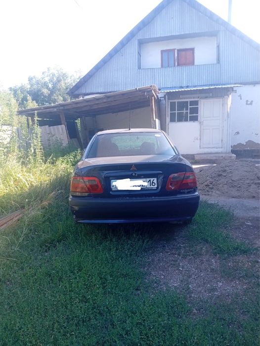 Mitsubishi carisma 2000 года