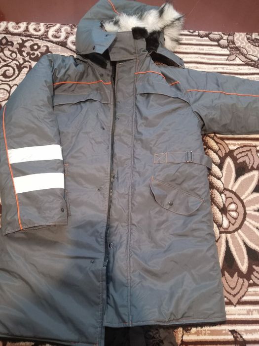 Продам зимний пуховик