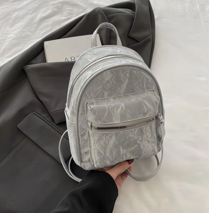 Женские сумки и косметички