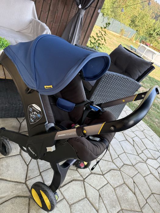 DOONA+ 2 in 1. Scoică auto și carucior