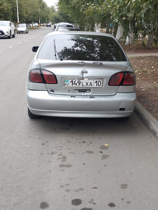 Нисан примьера р11