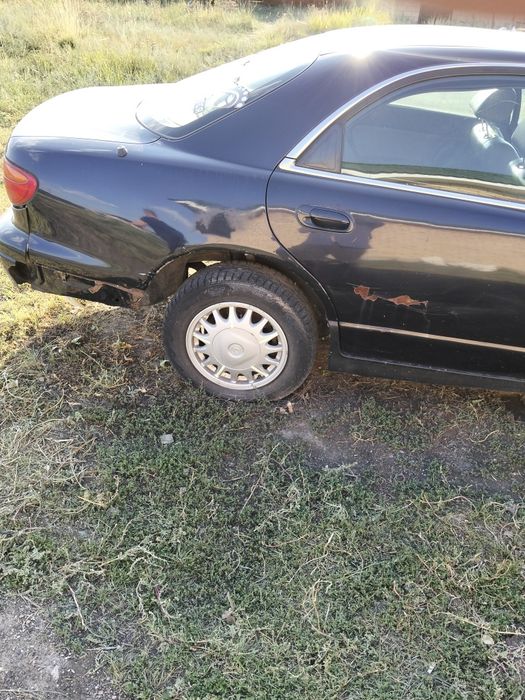 Продам авто мазда кседос 9