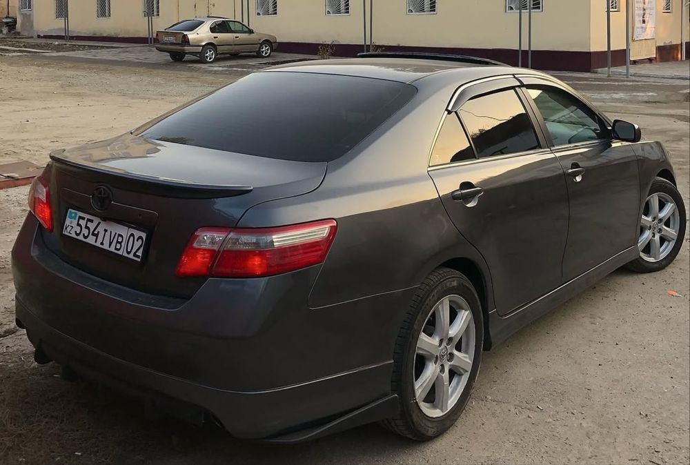 Элероны на задний бампер Камри