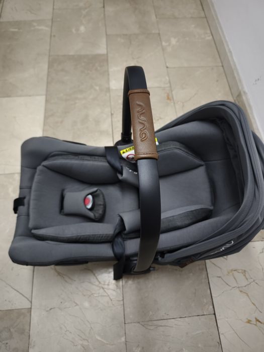 Scoică Auto Nuna PIPA Next i-Size (Granite) în garanție