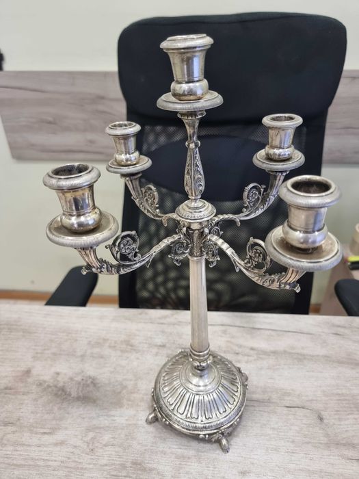 Стар сребърен свещник