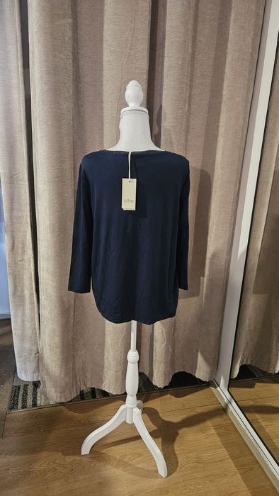 Bluza dama noua, Oltre