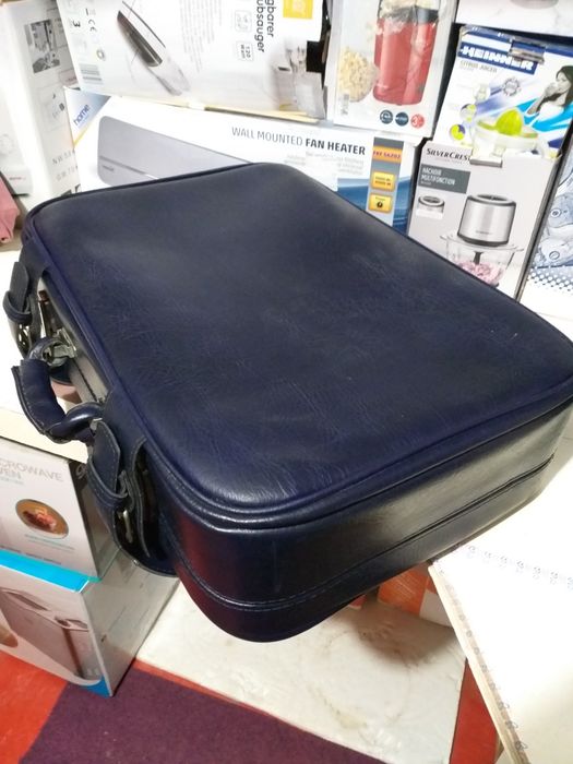 Geamantan Din Piele Groasa Si Rezistent