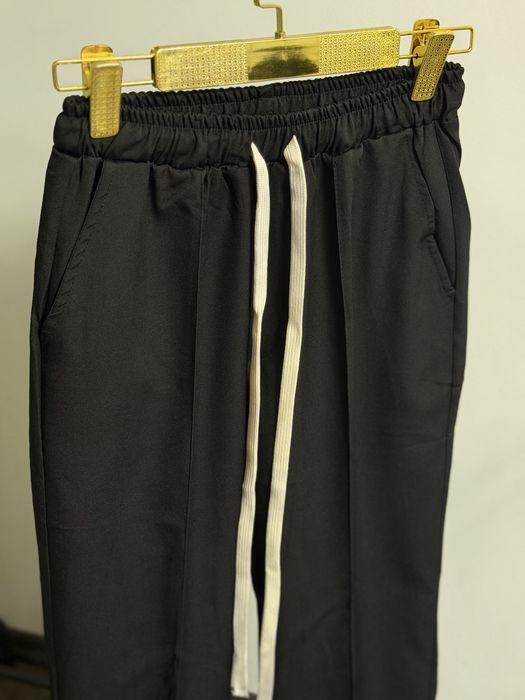 Pantaloni cu snururi Baggy