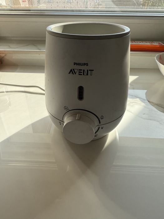 Уред за затопляне на храна и мляко Philips