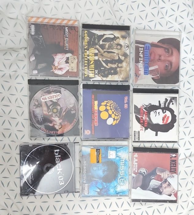Eminem, Madonna, LL Cool J, Dr. Dre, Enrique Iglesias Music disc CD's.