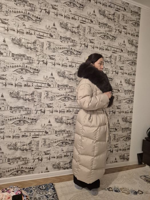 Продам пуховик зимний новый