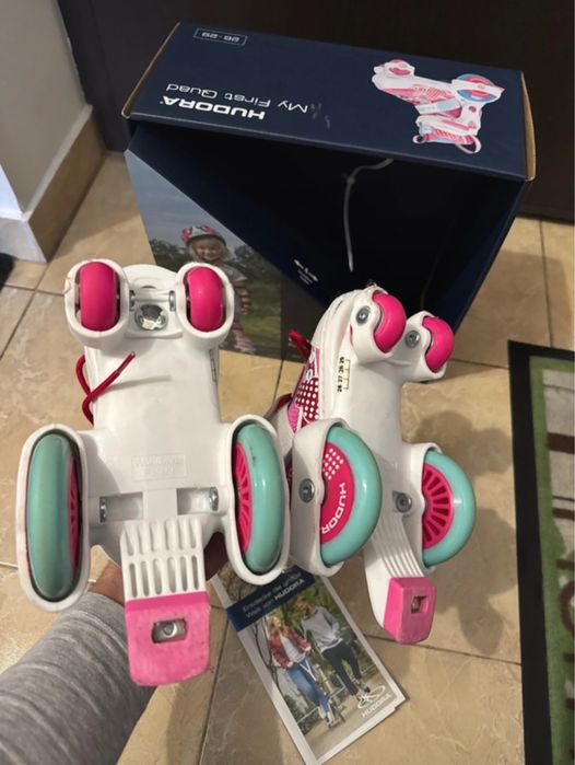 Patine cu rotile mărimi reglabile 26-29 - Roz, stare foarte buna.