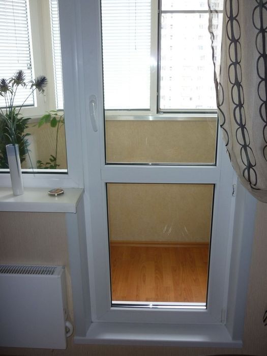 Стеклянные балконные двери