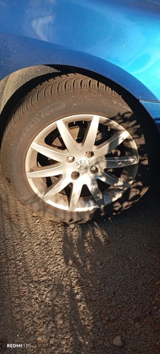 Jante Peugeot 16" + anvelope All Season – 4x108