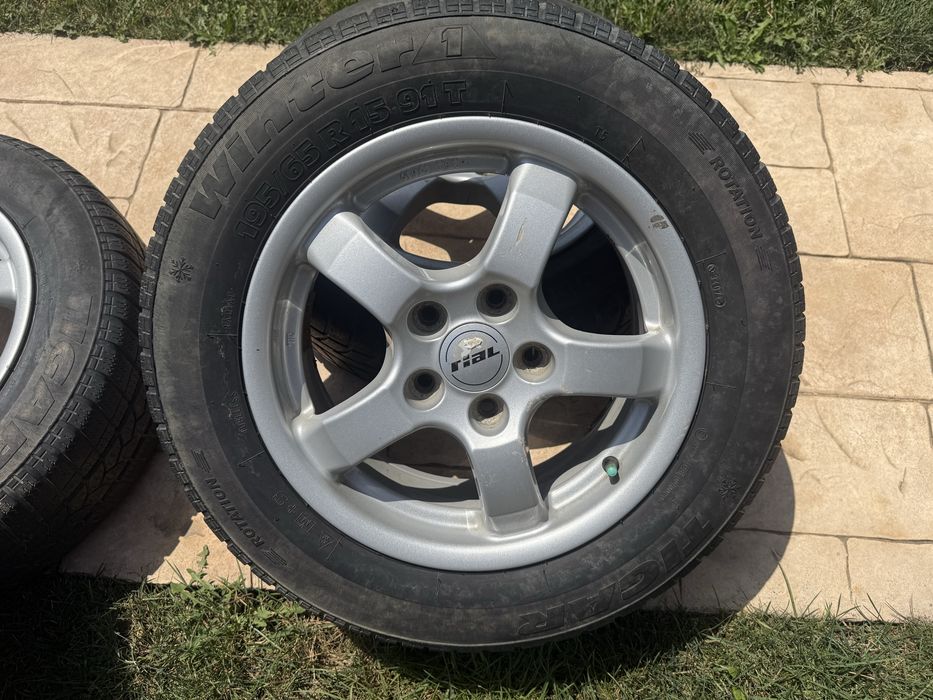 Jante aliaj Rial R15 cu anvelope de iarnă 195/65 R15 – set 4 buc.