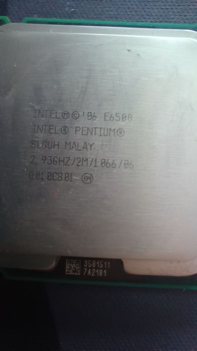 Процесор intel E 6500. Ram 2GB ,512 MB