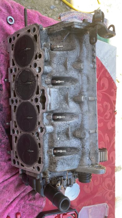 Chiulasă completă VW Passat B6 2.0 TDI BMP + ax cu came + injectoare + pompă vacuum/tandem