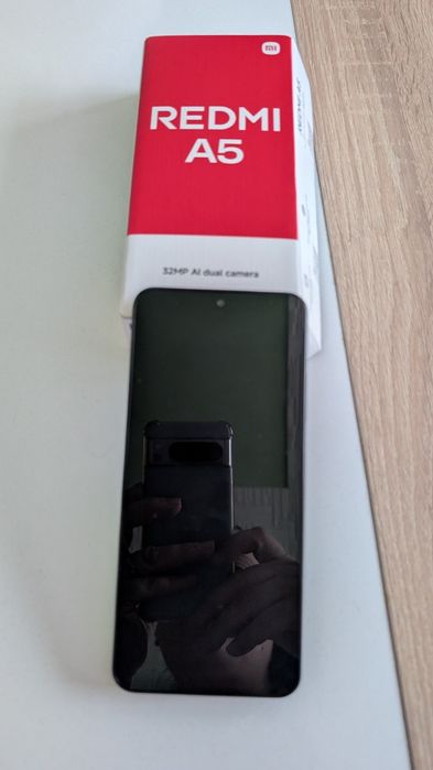 Телефон Redmi A5