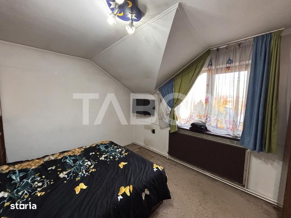 Casa individuala cu 5 camere +spatiu comercial  3 bai Sibiu