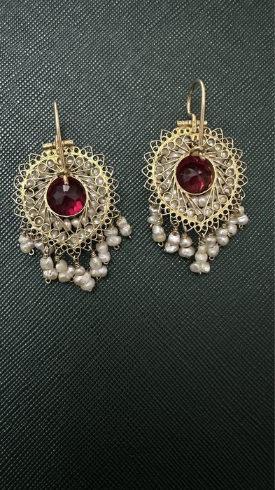 1950 йилларда ишланган товус пати шаклдаги зирак