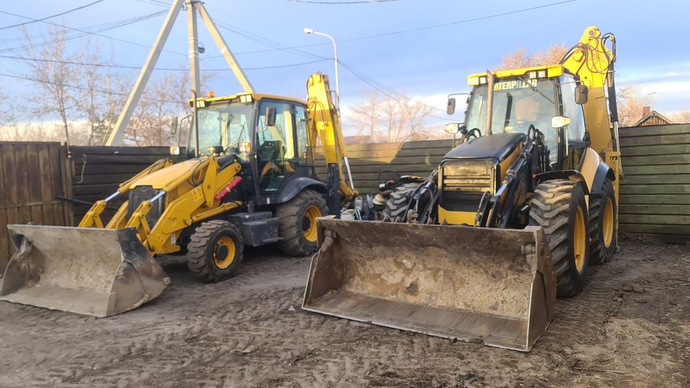 Экскаватор- погрузчик